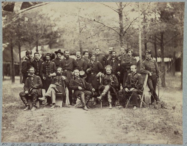Joseph Hooker and his staff, photographed in Falmouth in June 1863. That's Daniel Butterfield seated to Hooker's left (Library of Congress).