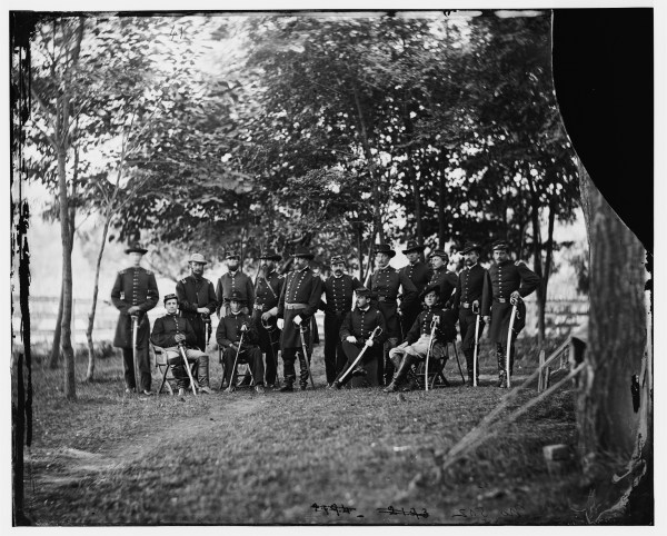 Maj. Gen. William French, commander of the III Corps, poses with his staff outside Culpeper sometime in September 1863. French stands in the group's center, looking slightly to his right. Click on the image to see a larger version (Library of Congress). 