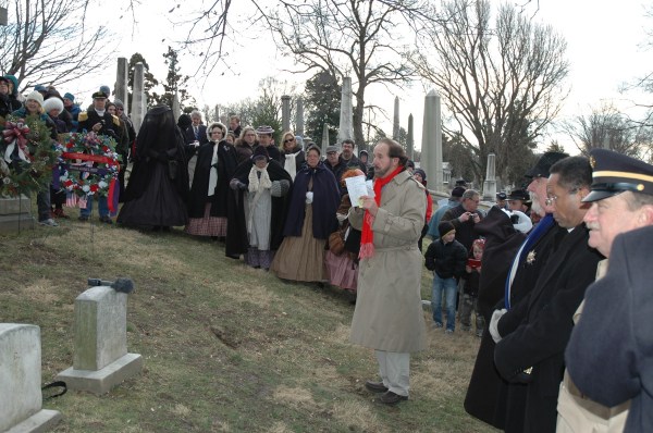 Prof. Andy Waskie, the founder and president of the General Meade Society of Philadelphia, leads the ceremony at the gravesite.