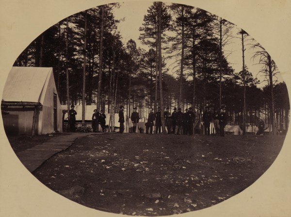 Meade's staff at the general's headquarters at Brandy Station in April 1865. Andrew Humphreys stands facing left in the center (Library of Congress. Click to enlarge).